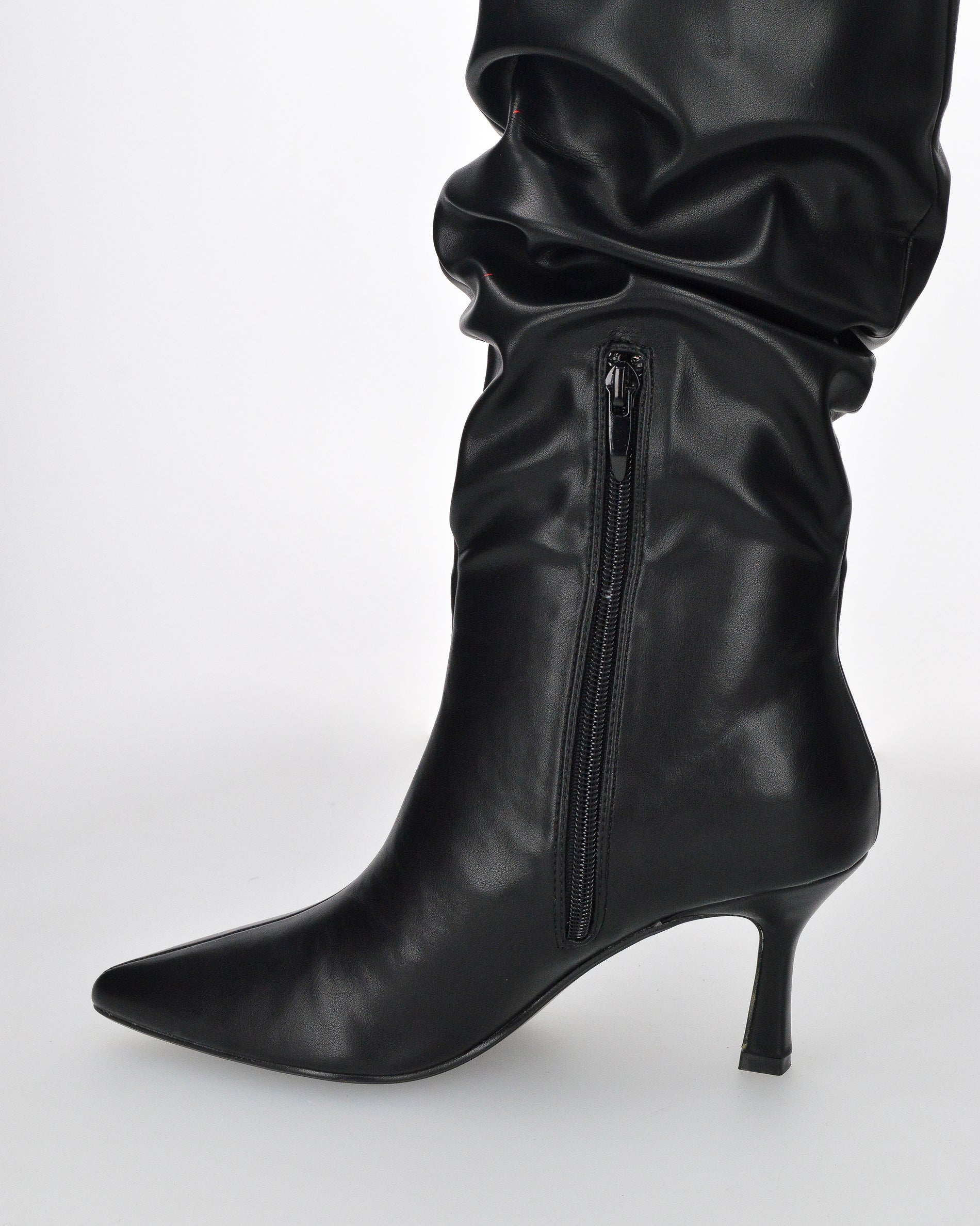 GRACY - tall slouchy boot with tapered toe in black faux leather