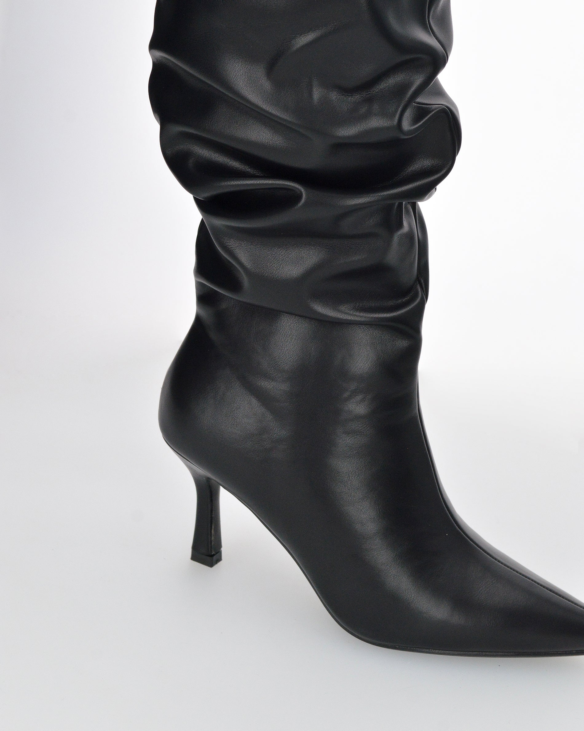 GRACY - tall slouchy boot with tapered toe in black faux leather
